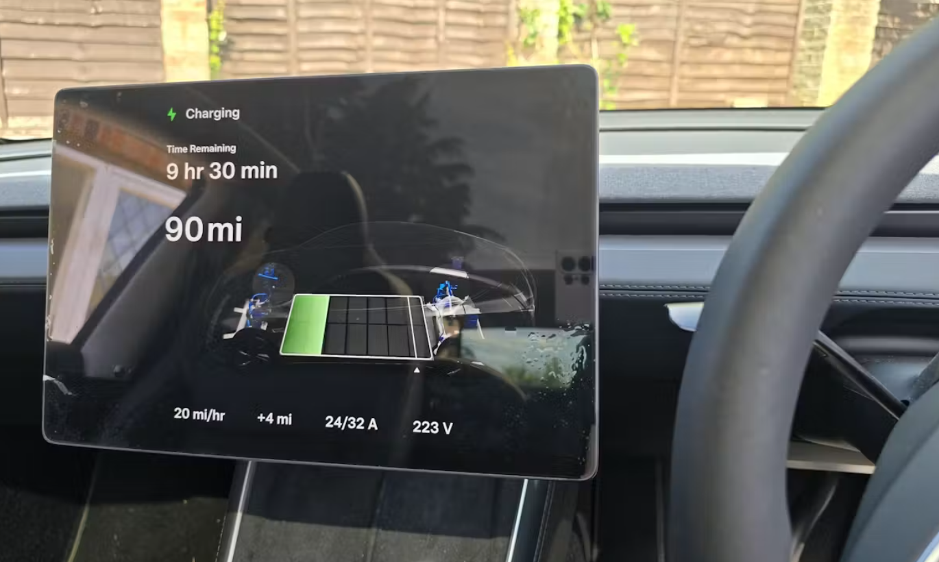Interior shot of tesla vehicle showing central control screen